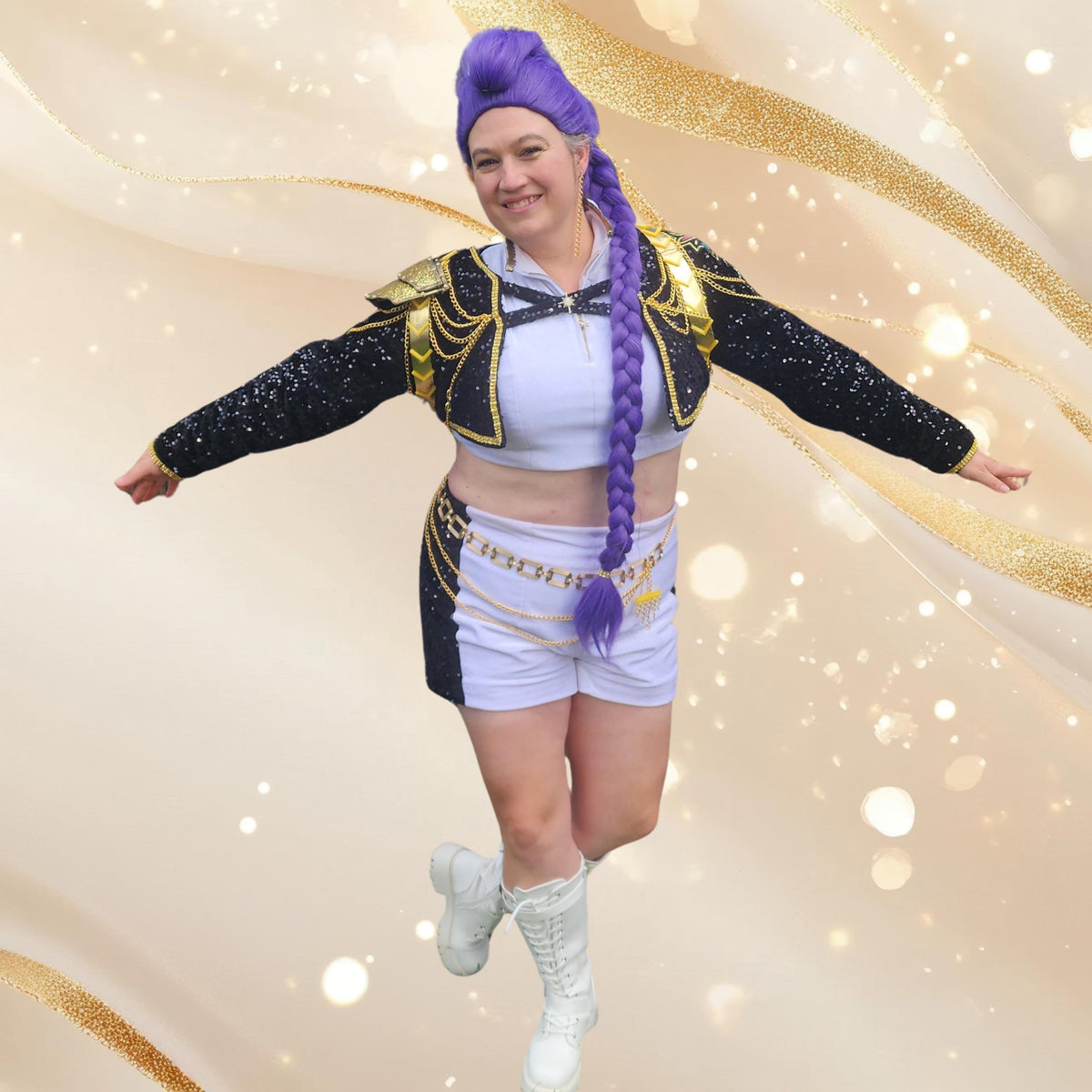 Woman with arms out in the full black, gold and white K-pop warrior cosplay outfit