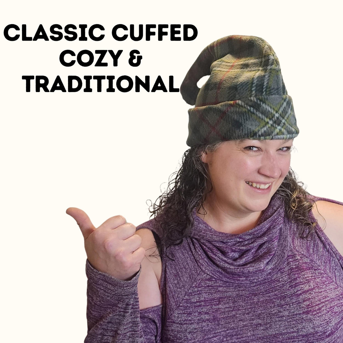 Woman giving a thumbs up in a classic cuffed plaid fleece elf hat, cozy and traditional