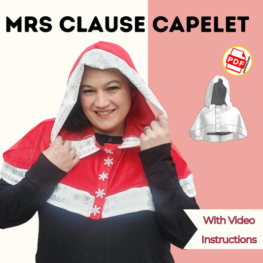 Mrs Claus capelet sewing pattern cover with a woman in a red hooded capelet with white trim and snowflake buttons, with video