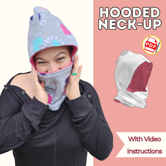 Hooded neck-up sewing pattern cover with a woman in a gray print fleece hood with pink lining pulled over her nose, with video