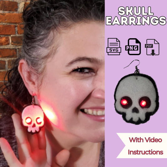 Light-up skull earrings sewing pattern cover with a smiling woman wearing a glowing felt skull earring, SVG, PNG and PDF files