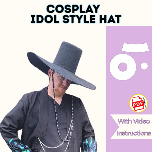 Cosplay idol style hat sewing pattern cover: man in a tall black felt wide-brim K-pop inspired hat and long cloak