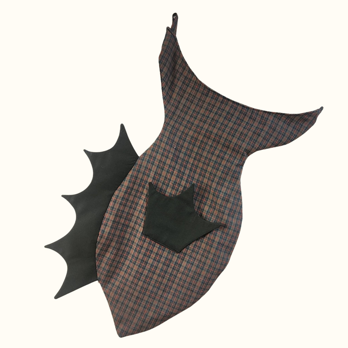 Finished brown plaid fish stocking with black fins and tail